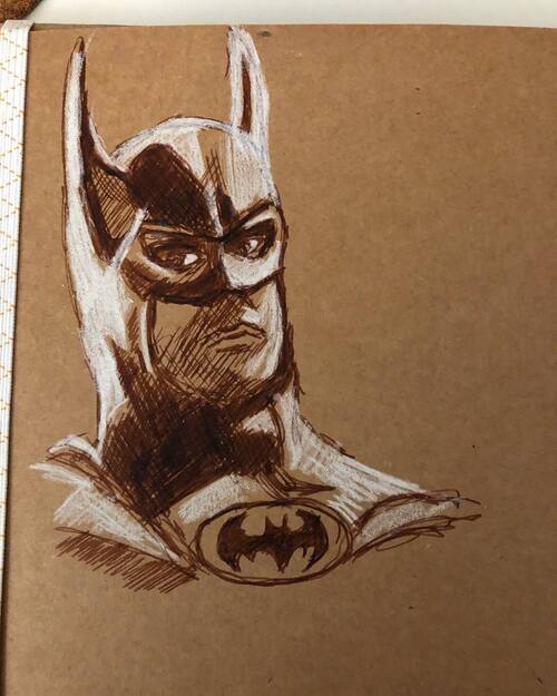 brown ink sketch of Michael Keaton as Batman