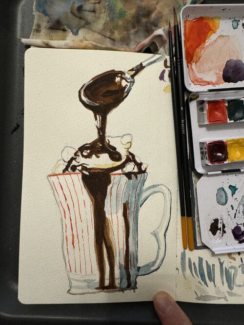 Watercolor sketch of a mug with hot chocolate dripping into it from a spoon above. There's some large marshmallows inside and chocolate dripping down the side. The mug has red vertical stripes