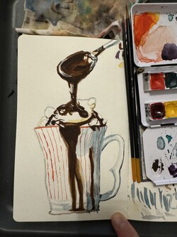 Watercolor sketch of a mug with hot chocolate dripping into it from a spoon above. There's some large marshmallows inside and chocolate dripping down the side. The mug has red vertical stripes